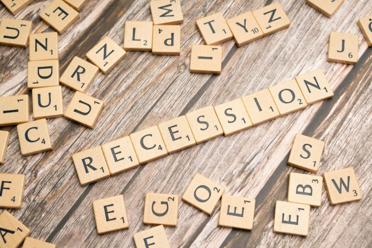 The word recession spelled out with scrabble letters